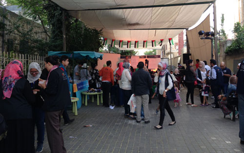 Ammanis and visitors attend a cultural activity in Jabal Amman over the weekend (Photo by Muath Freij)